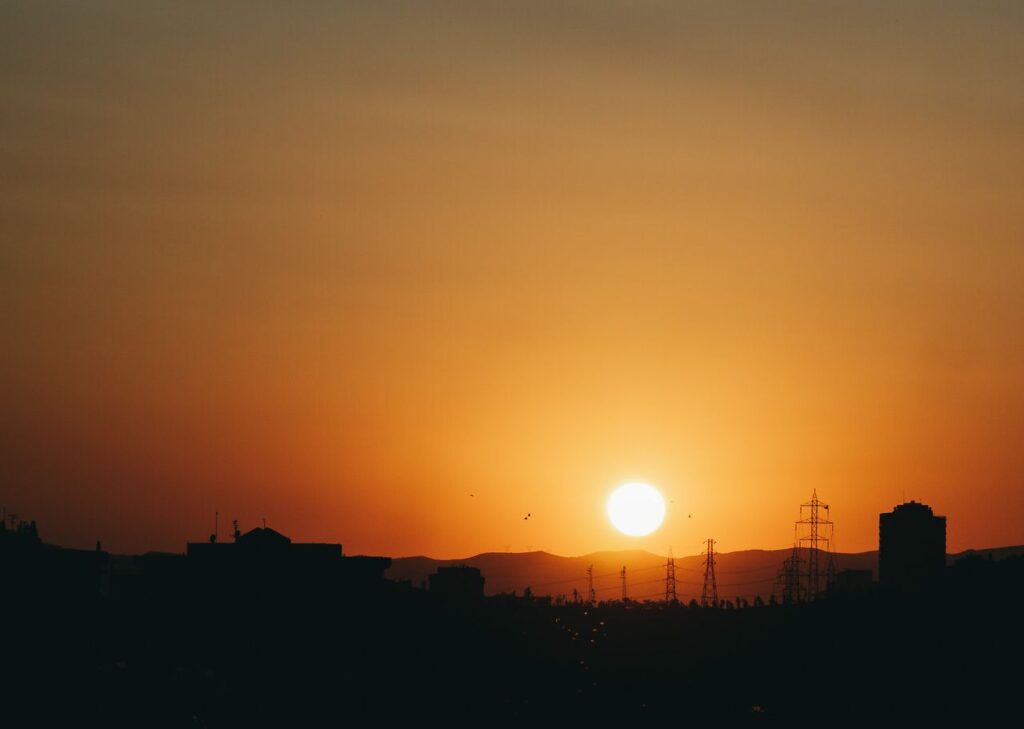 Captivating sunset over Ankara with silhouetted skyline and warm hues.